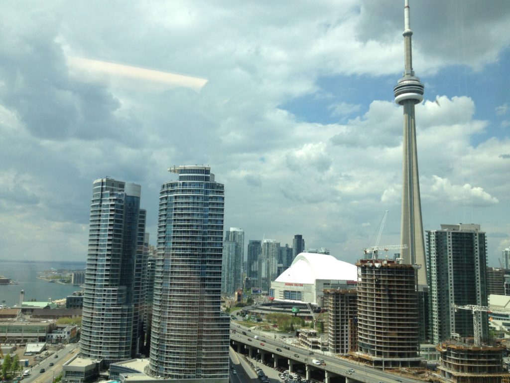 View of CN Tower and water from office window at McCann